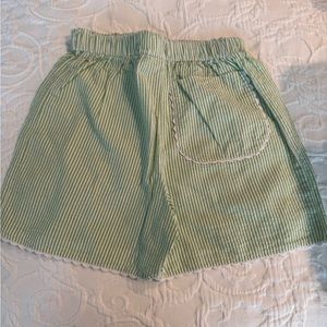 Lime, green, and white Bella Bliss shorts. Size 7. Adorable white trim at bottom